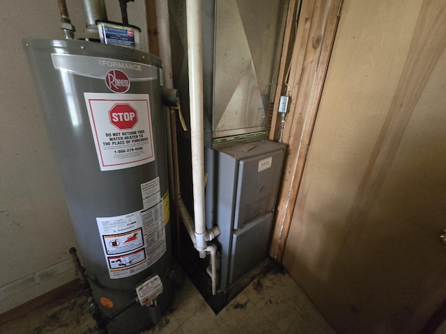 3547 Kay Rd, Lewiston, MI 49756 - utility room with gas water heater
