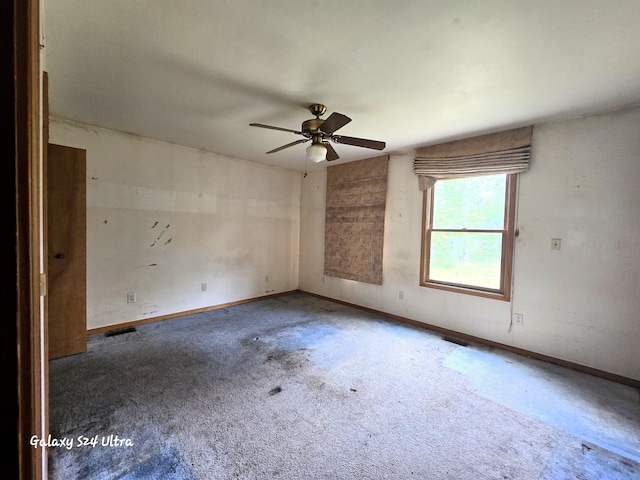 3547 Kay Rd, Lewiston, MI 49756 - carpeted spare room featuring a ceiling fan and baseboards