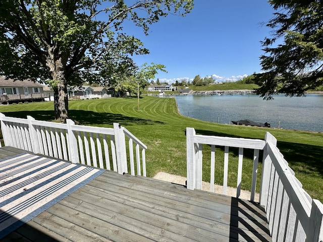 9452 M33, Cheboygan, MI 49721 - deck featuring a water view and a lawn