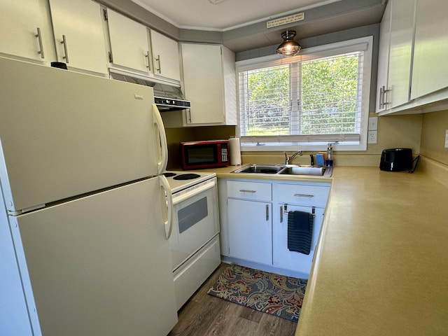 9452 M33, Cheboygan, MI 49721 - kitchen with white appliances, a sink, light countertops, and white cabinetry