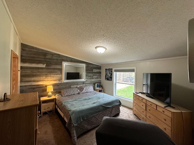 1085 Five Lakes Rd, Gaylord, MI 49735 - bedroom featuring wooden walls, carpet floors, lofted ceiling, and a textured ceiling