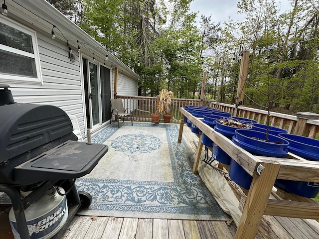 1085 Five Lakes Rd, Gaylord, MI 49735 - wooden deck featuring view of scattered trees