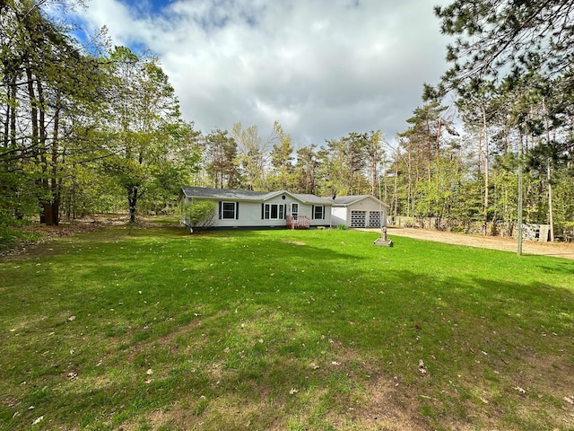 1085 Five Lakes Rd, Gaylord, MI 49735 - view of front facade with a front yard