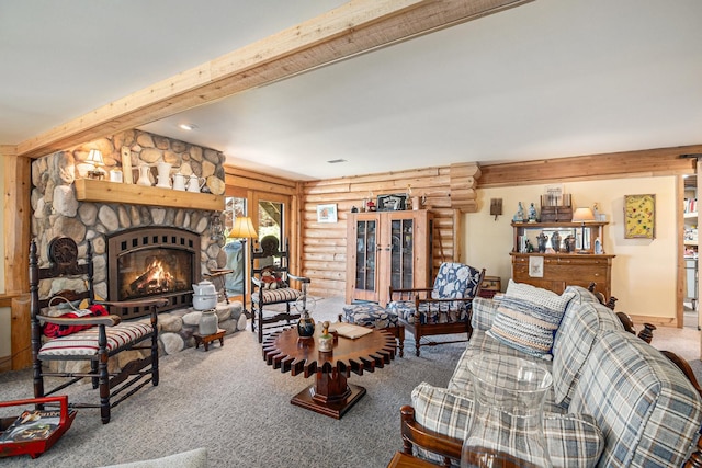 10924 E Grand Lake Rd, Presque Isle, MI 49777 - living area with log walls, carpet, a stone fireplace, and beam ceiling