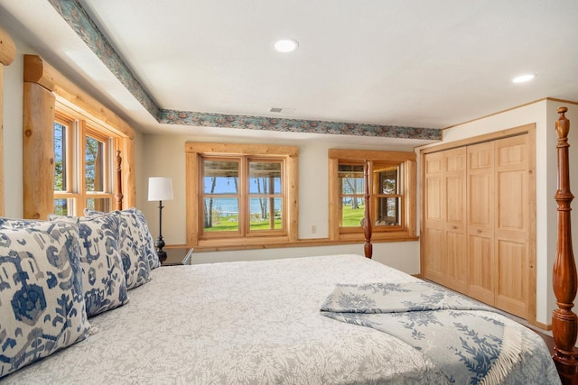 10924 E Grand Lake Rd, Presque Isle, MI 49777 - bedroom featuring recessed lighting and a closet