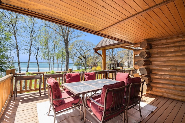 10924 E Grand Lake Rd, Presque Isle, MI 49777 - wooden deck with a water view and outdoor dining space