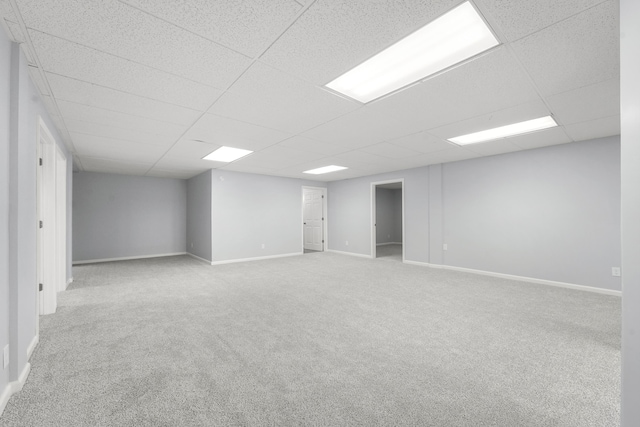 4348 W Lakeside Dr, West Branch, MI 48661 - carpeted empty room featuring a drop ceiling and baseboards