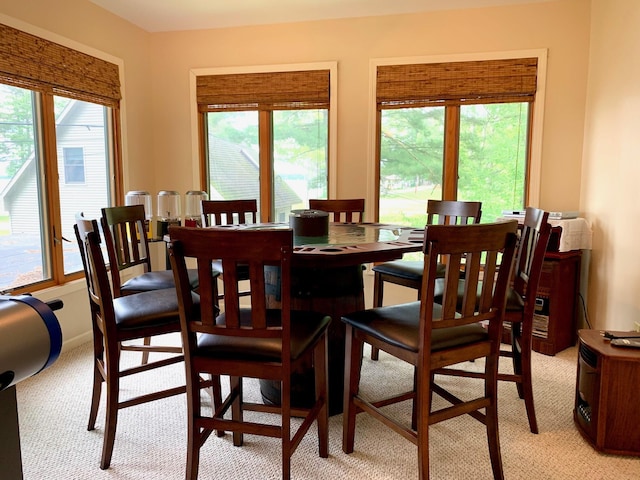 132 16th St, Prudenville, MI 48651 - dining room featuring light carpet