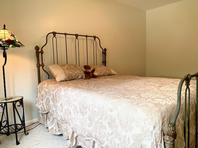 132 16th St, Prudenville, MI 48651 - carpeted bedroom with baseboards