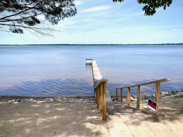 132 16th St, Prudenville, MI 48651 - dock area with a boat ramp and a water view