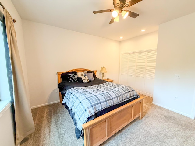 116 No Wake Ct, Houghton Lake, MI 48629 - carpeted bedroom featuring a closet, recessed lighting, baseboards, and a ceiling fan