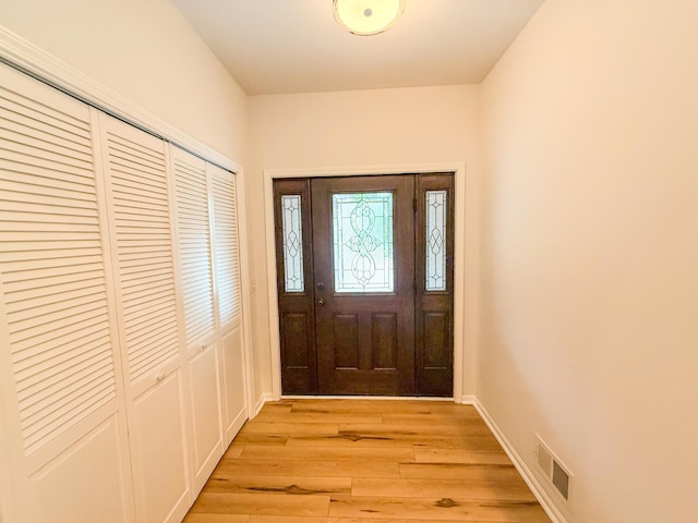 116 No Wake Ct, Houghton Lake, MI 48629 - entryway with light wood finished floors