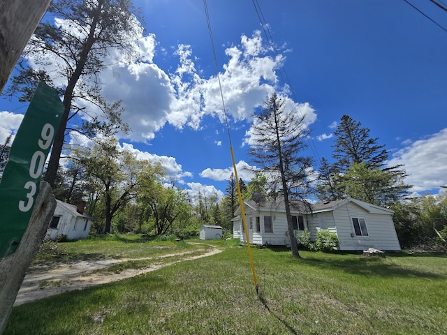 903 W 8th St, Mio, MI 48647 - view of green lawn