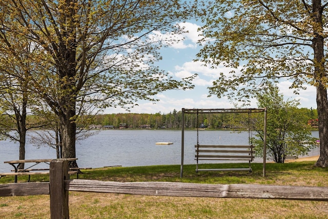 6192 Wilderness Dr, Mancelona, MI 49659 - dock featuring a water view