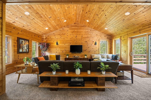 6192 Wilderness Dr, Mancelona, MI 49659 - carpeted living room with lofted ceiling, wooden walls, wooden ceiling, and recessed lighting