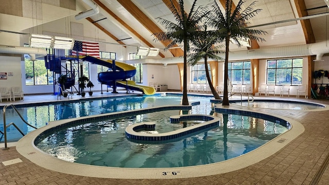 6192 Wilderness Dr, Mancelona, MI 49659 - indoor community pool with a water slide