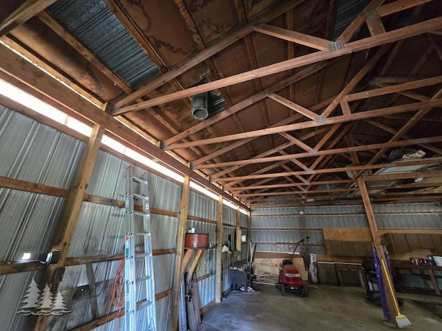 3557 Penn Rd, Lewiston, MI 49756 - misc room featuring concrete flooring, lofted ceiling, and a garage