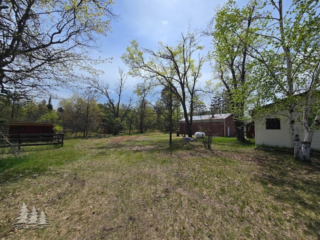 3557 Penn Rd, Lewiston, MI 49756 - view of yard featuring an outbuilding
