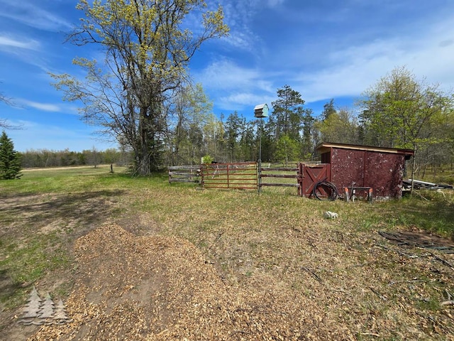 3557 Penn Rd, Lewiston, MI 49756 - view of yard featuring an outbuilding