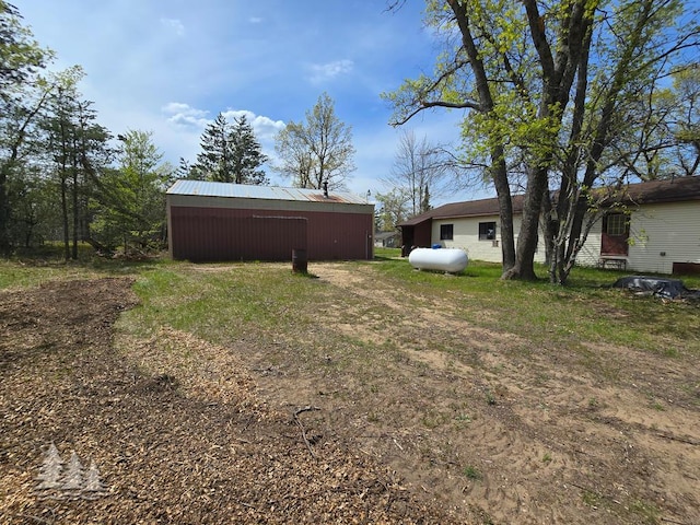 3557 Penn Rd, Lewiston, MI 49756 - view of yard with a pole building and an outdoor structure
