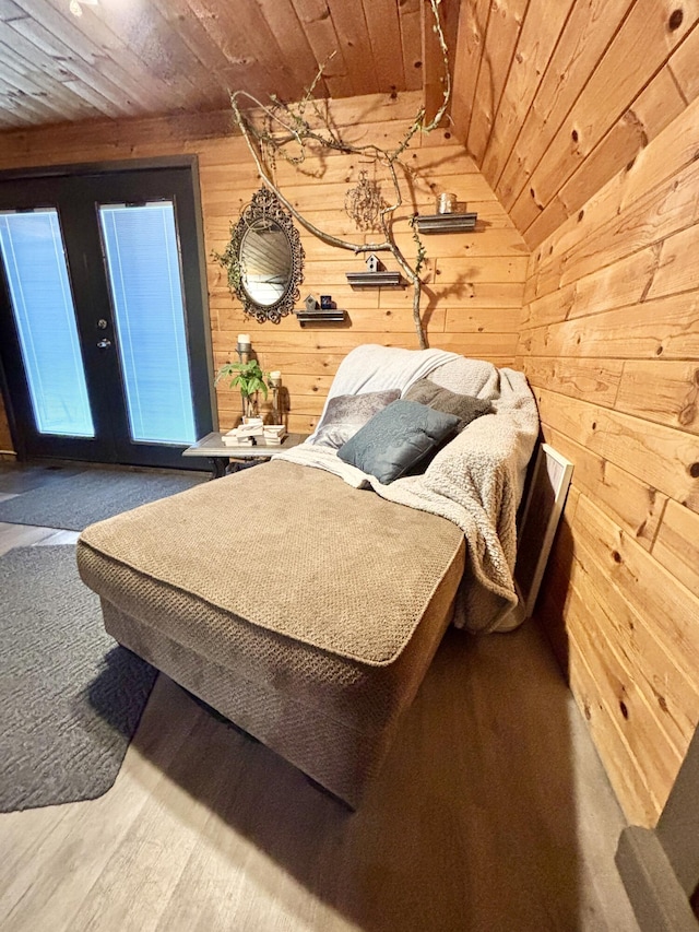 3334 Pleasant View Dr, Lewiston, MI 49756 - bedroom featuring wooden ceiling, wood walls, vaulted ceiling, french doors, and wood finished floors