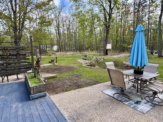 3334 Pleasant View Dr, Lewiston, MI 49756 - view of grassy yard with outdoor dining space and a patio