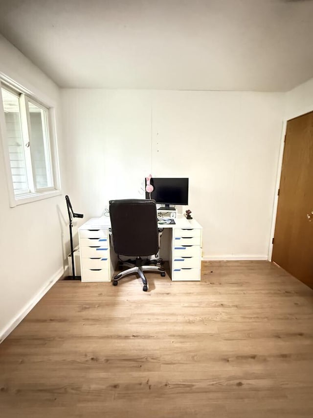 116 1st St, Hubbard Lake, MI 49747 - office space featuring light wood-style flooring and baseboards