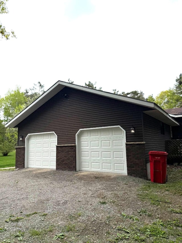 116 1st St, Hubbard Lake, MI 49747 - view of garage
