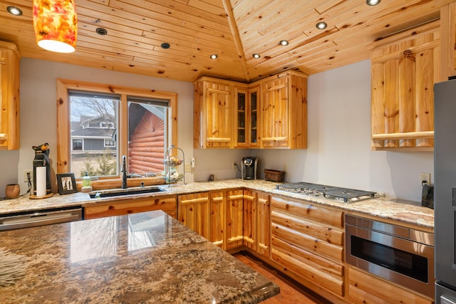 5997 Prospect St, Indian River, MI 49749 - kitchen featuring wood ceiling, wood finished floors, appliances with stainless steel finishes, a sink, and light stone counters