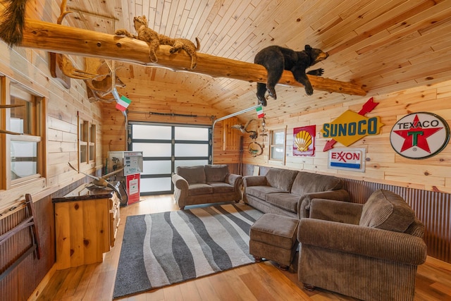 5997 Prospect St, Indian River, MI 49749 - living area with wood walls, wood-type flooring, and wooden ceiling