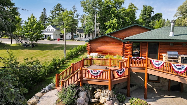 5997 Prospect St, Indian River, MI 49749 - wooden deck featuring a yard and a grill