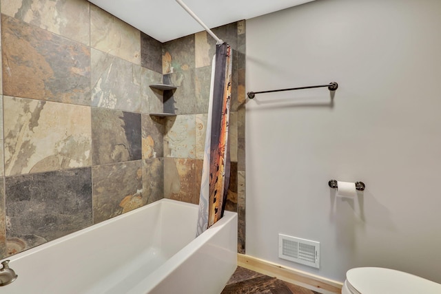 5997 Prospect St, Indian River, MI 49749 - bathroom with toilet, shower / bathtub combination with curtain, and baseboards