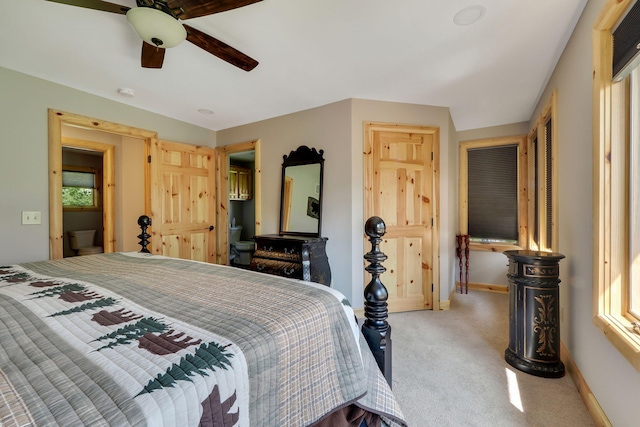 5997 Prospect St, Indian River, MI 49749 - carpeted bedroom featuring baseboards and a ceiling fan