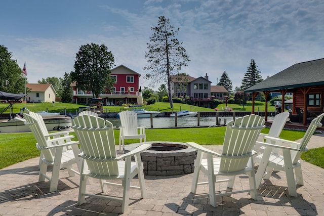 5997 Prospect St, Indian River, MI 49749 - view of patio featuring a fire pit, a water view, and a gazebo