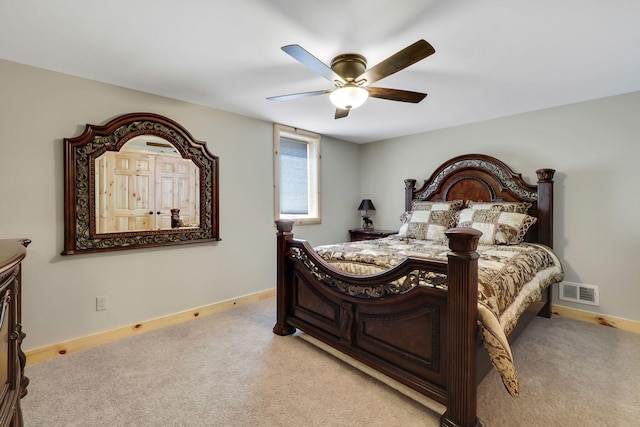 5997 Prospect St, Indian River, MI 49749 - bedroom with light carpet, baseboards, and a ceiling fan