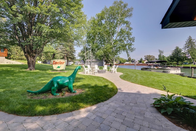 5997 Prospect St, Indian River, MI 49749 - view of playground featuring a yard and a patio