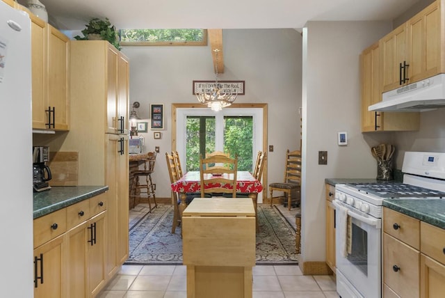 2715 Indian Rd, Brutus, MI 49716 - kitchen featuring white appliances, under cabinet range hood, light brown cabinetry, a chandelier, and vaulted ceiling