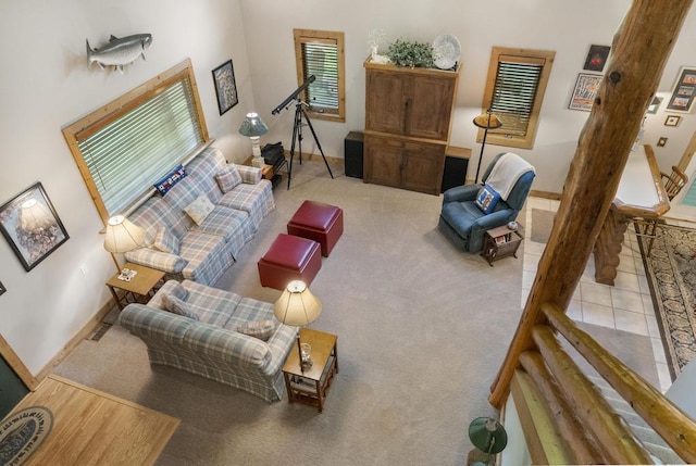 2715 Indian Rd, Brutus, MI 49716 - carpeted living room featuring baseboards