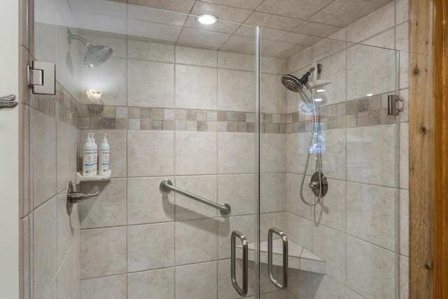 2715 Indian Rd, Brutus, MI 49716 - bathroom featuring a shower stall