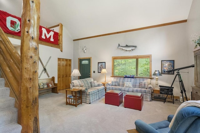 2715 Indian Rd, Brutus, MI 49716 - living room featuring high vaulted ceiling, carpet floors, and stairs