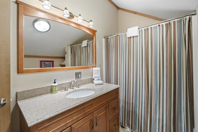 2715 Indian Rd, Brutus, MI 49716 - bathroom with vanity and lofted ceiling