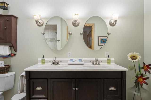 2715 Indian Rd, Brutus, MI 49716 - full bath with double vanity and toilet