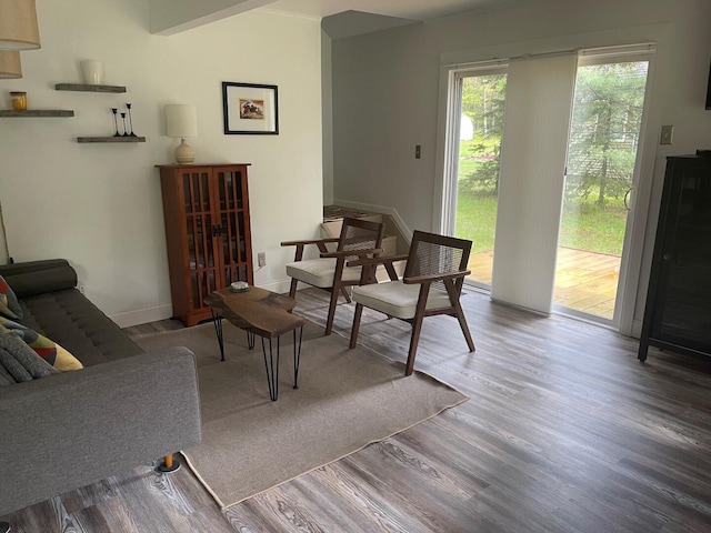 117 Swift Deer Trl, Prudenville, MI 48651 - living area featuring wood finished floors and baseboards