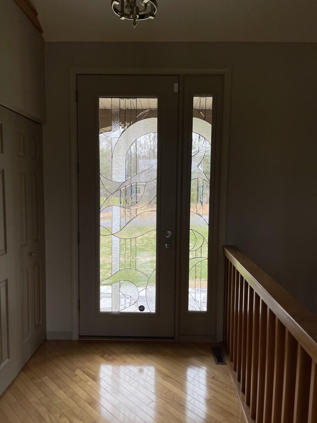 164 Invitational Dr, Gaylord, MI 49735 - foyer entrance with light wood finished floors