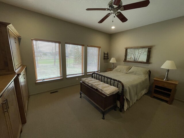 164 Invitational Dr, Gaylord, MI 49735 - bedroom featuring light colored carpet, a ceiling fan, and recessed lighting