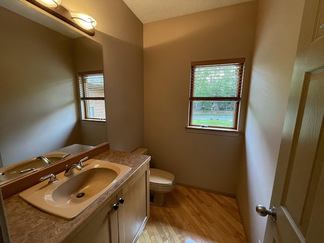164 Invitational Dr, Gaylord, MI 49735 - bathroom with wood finished floors and vanity