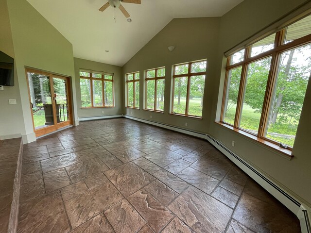 164 Invitational Dr, Gaylord, MI 49735 - unfurnished sunroom with plenty of natural light, vaulted ceiling, and baseboard heating