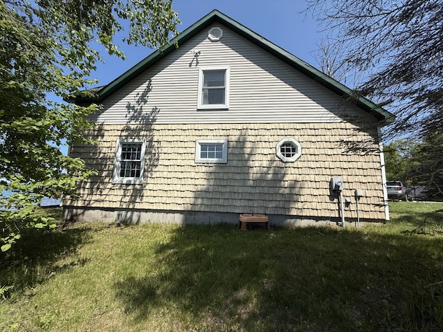 13551 US-23, Cheboygan, MI 49721 - view of side of home with a lawn