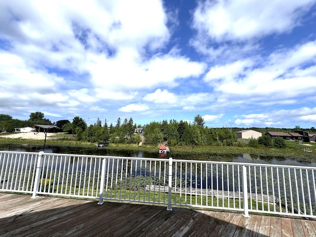 1537 Tecumseh Rd, Cheboygan, MI 49721 - wooden deck with a water view