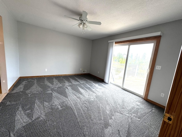 1537 Tecumseh Rd, Cheboygan, MI 49721 - carpeted empty room featuring a ceiling fan, baseboards, and a textured ceiling